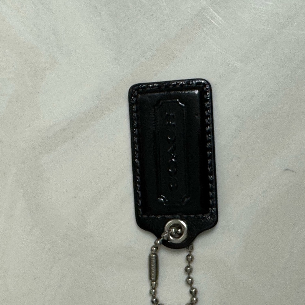 Coach Black Leather tag